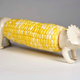 Illustration for article titled Dino Corn Cob Holders Convince Your Kids to Eat Their Veggies